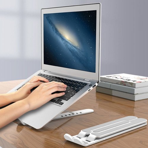 Foldable and adjustable laptop stand