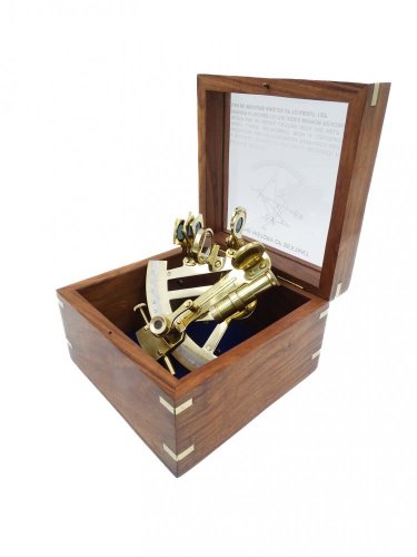Brass sextant in box