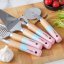 Vegetable peeler with wooden handle - pink-blue